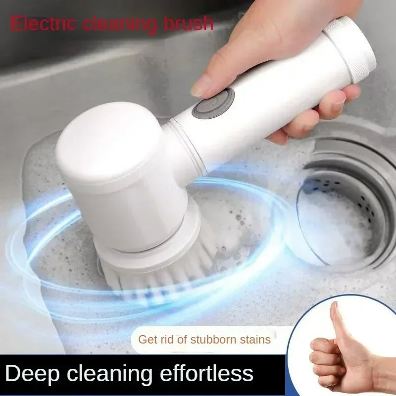 Cordless electric spin scrubber cleaning a kitchen sink with rechargeable rotating brush